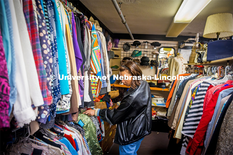 Ariana Joy Cobler shops at Ruby Begonia's Vintage Clothing Store. About Lincoln at Ruby Begonia’s Vintage Clothing Store. October 18, 2023. Photo by Kristen Labadie / University Communication.